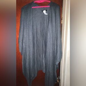 Gray throw over. Very comfortable